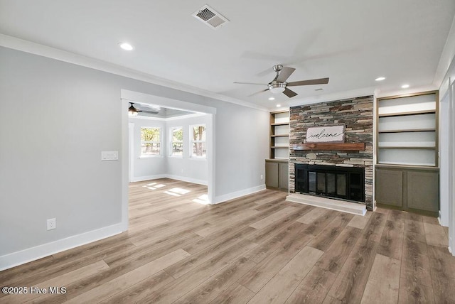 1324 S Shore Dr, Southport, NC 28461 - unfurnished living room featuring a ceiling fan, baseboards, wood finished floors, crown molding, and recessed lighting