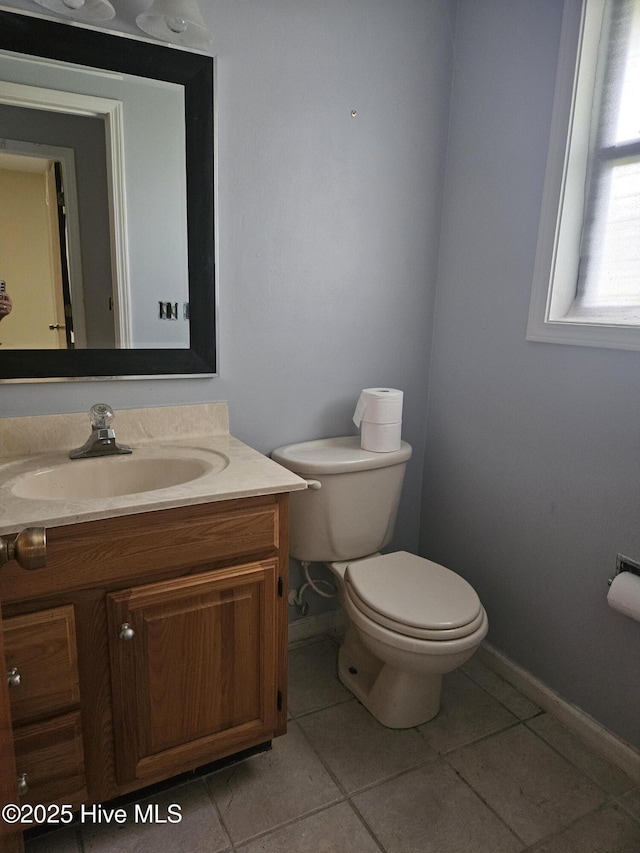 4 Cleek Ct, Carolina Shores, NC 28467 - half bathroom featuring toilet, tile patterned floors, vanity, and baseboards