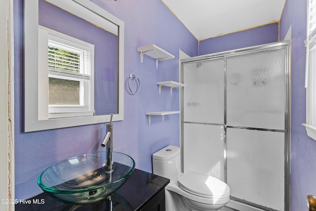 full bathroom with a shower stall, toilet, vanity, and a baseboard heating unit