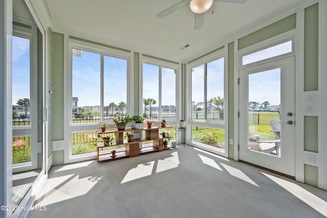 357 Spicer Lake Dr, Holly Ridge, NC 28445 - sunroom / solarium with a water view and carpet flooring