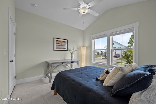 357 Spicer Lake Dr, Holly Ridge, NC 28445 - bedroom featuring light carpet, baseboards, vaulted ceiling, and ceiling fan