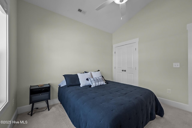 357 Spicer Lake Dr, Holly Ridge, NC 28445 - bedroom featuring light carpet, baseboards, high vaulted ceiling, and a ceiling fan