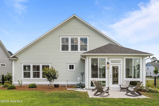 357 Spicer Lake Dr, Holly Ridge, NC 28445 - back of house with a patio area, a sunroom, and roof with shingles
