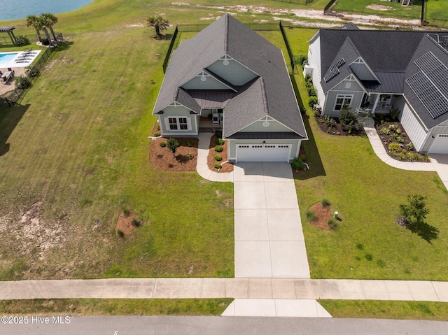 357 Spicer Lake Dr, Holly Ridge, NC 28445 - view from above of property with a nearby body of water