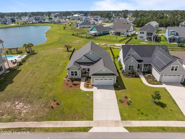 357 Spicer Lake Dr, Holly Ridge, NC 28445 - aerial perspective of suburban area featuring a large body of water