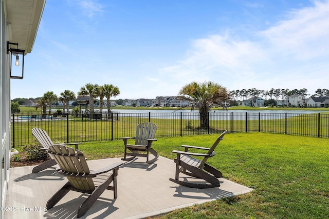 357 Spicer Lake Dr, Holly Ridge, NC 28445 - view of patio with a water view and a residential view