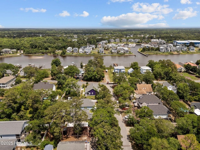 159 NE 31st St, Oak Island, NC 28465 - aerial perspective of suburban area featuring a nearby body of water