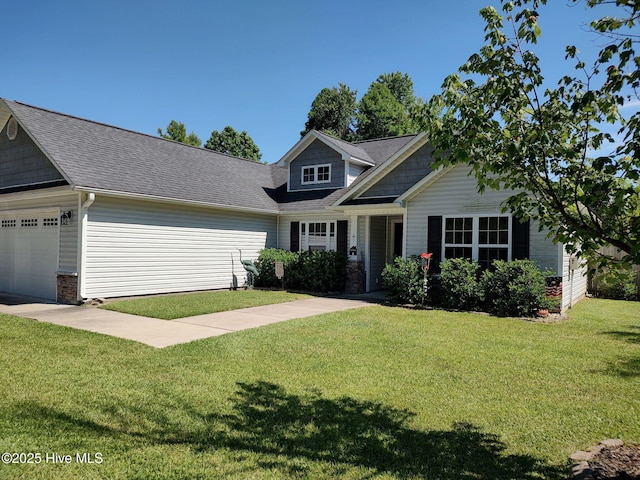 craftsman inspired home featuring an attached garage, a front lawn, and a shingled roof