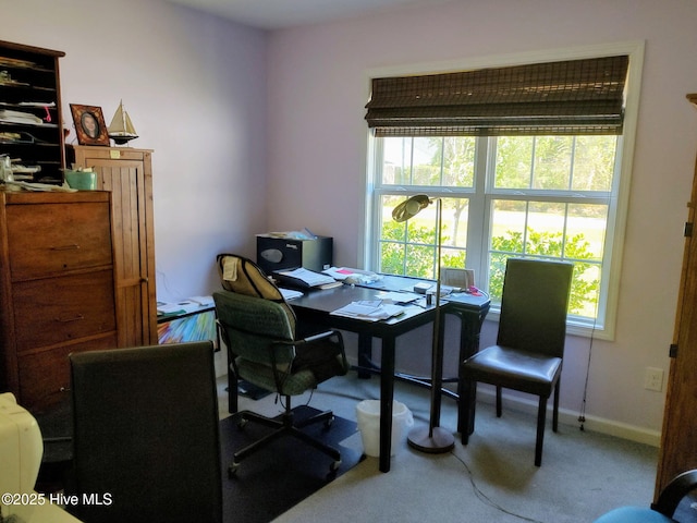 home office featuring carpet floors and baseboards