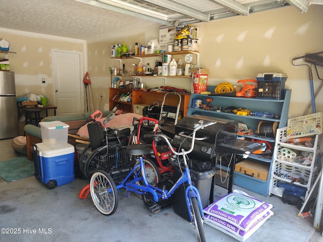 garage with freestanding refrigerator
