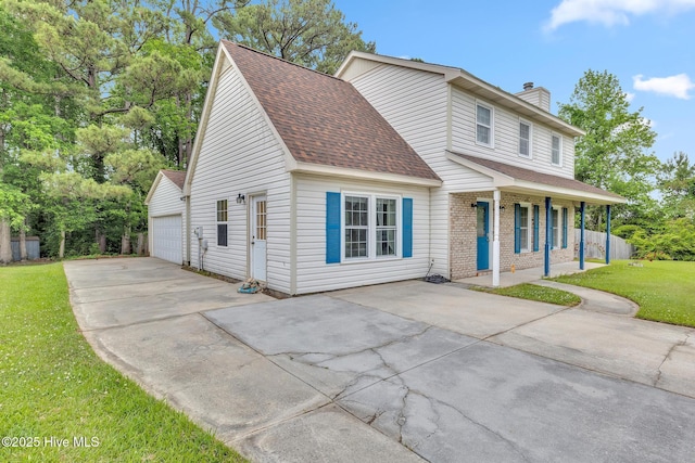 304 Pebble Ln, Jacksonville, NC 28546 - view of front of property featuring roof with shingles, a porch, a front lawn, a chimney, and brick siding