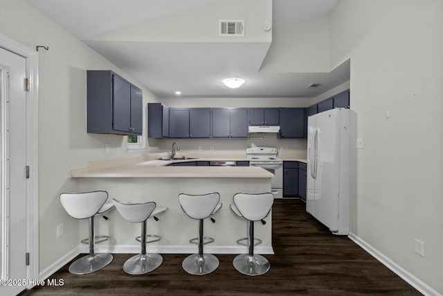 208 E Lakeridge Lndg, Jacksonville, NC 28546 - kitchen featuring blue cabinetry, white appliances, under cabinet range hood, a sink, and a peninsula