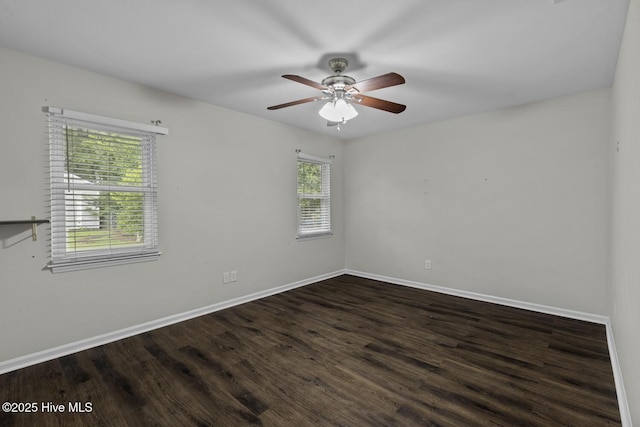 208 E Lakeridge Lndg, Jacksonville, NC 28546 - empty room featuring baseboards, ceiling fan, and wood finished floors