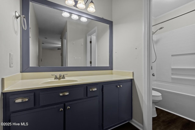 208 E Lakeridge Lndg, Jacksonville, NC 28546 - bathroom with toilet, vanity, bathtub / shower combination, and wood finished floors