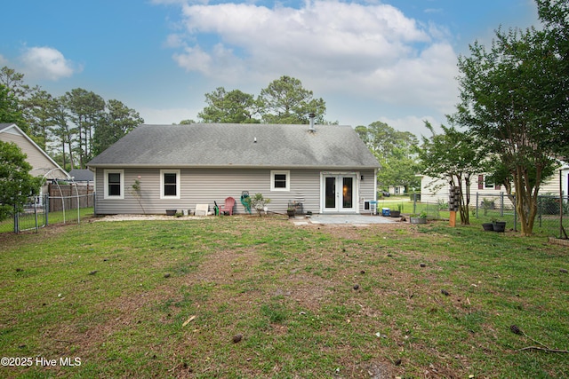 208 E Lakeridge Lndg, Jacksonville, NC 28546 - rear view of house featuring french doors and a patio area