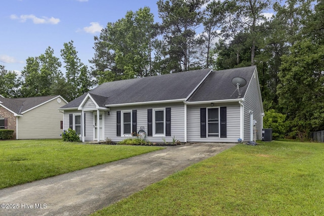 208 E Lakeridge Lndg, Jacksonville, NC 28546 - ranch-style home with cooling unit, a front yard, driveway, and a shingled roof