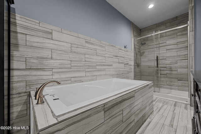 2142 Raccoon Rd, Willard, NC 28478 - bathroom with a bath, a stall shower, and recessed lighting