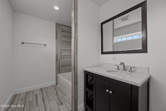 2142 Raccoon Rd, Willard, NC 28478 - full bath featuring vanity, recessed lighting, and baseboards