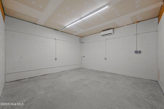2142 Raccoon Rd, Willard, NC 28478 - garage featuring a wall unit AC and concrete block wall