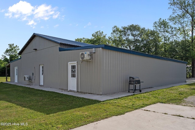 2142 Raccoon Rd, Willard, NC 28478 - view of property exterior featuring a lawn and a cooling unit