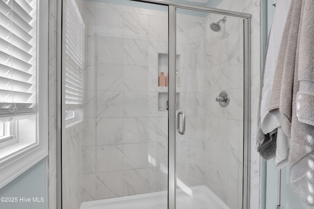 bathroom featuring a stall shower