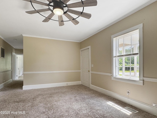 402 Warren St, Williamston, NC 27892 - unfurnished room featuring ornamental molding, carpet, ceiling fan, and baseboards