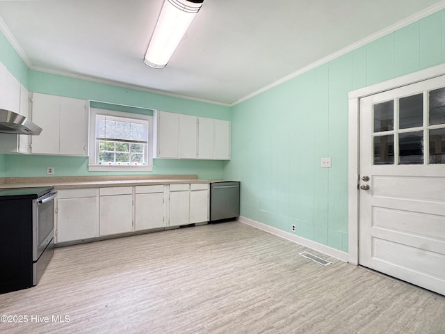 402 Warren St, Williamston, NC 27892 - kitchen with stainless steel appliances, light wood-style flooring, white cabinets, and ornamental molding