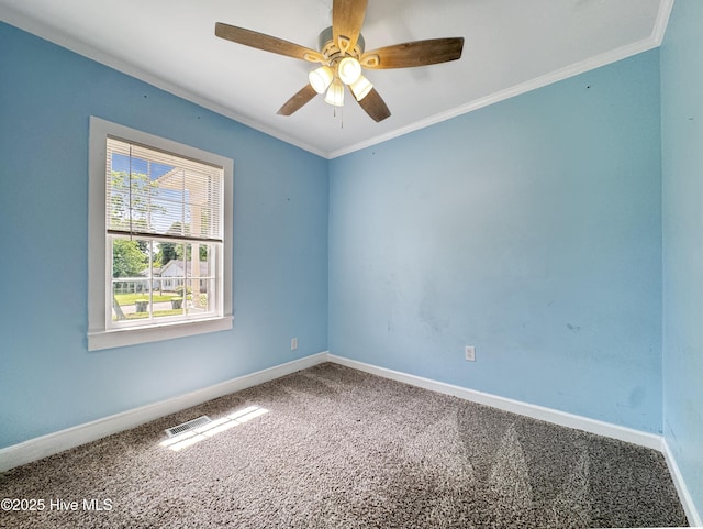 402 Warren St, Williamston, NC 27892 - unfurnished room featuring carpet, baseboards, a ceiling fan, and ornamental molding