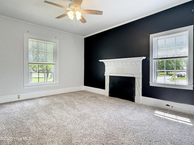 402 Warren St, Williamston, NC 27892 - unfurnished living room with plenty of natural light, carpet flooring, ceiling fan, ornamental molding, and a fireplace
