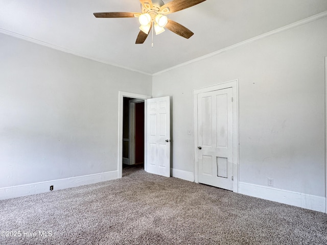 402 Warren St, Williamston, NC 27892 - unfurnished bedroom featuring carpet floors, ornamental molding, baseboards, and a ceiling fan