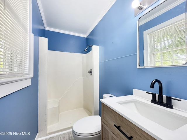 402 Warren St, Williamston, NC 27892 - full bathroom featuring a shower, toilet, crown molding, wood finished floors, and vanity