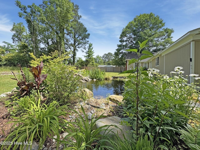 402 Warren St, Williamston, NC 27892 - water view with fence and a small pond