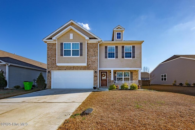 308 Isabelle St Lot # 986, New Bern, NC 28560 - view of front of home featuring a porch, a garage, driveway, and brick siding
