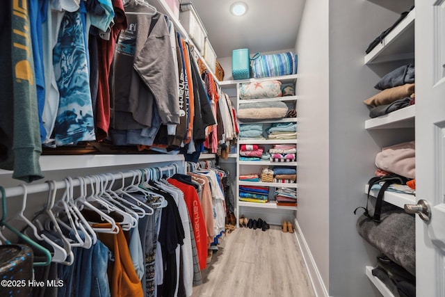 152 NW 1st St, Oak Island, NC 28465 - spacious closet with wood finished floors