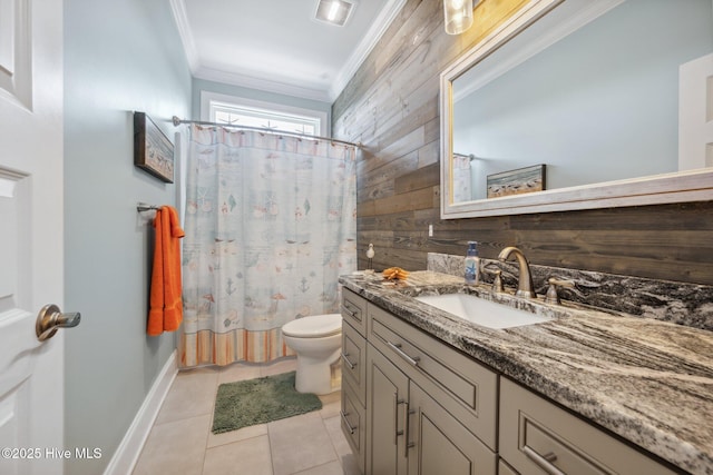 152 NW 1st St, Oak Island, NC 28465 - bathroom featuring ornamental molding, vanity, toilet, tile patterned floors, and wooden walls
