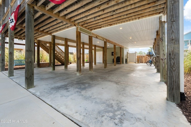 152 NW 1st St, Oak Island, NC 28465 - view of patio / terrace with stairs