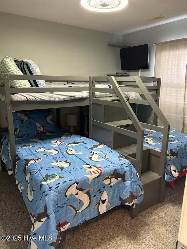 bedroom featuring carpet flooring