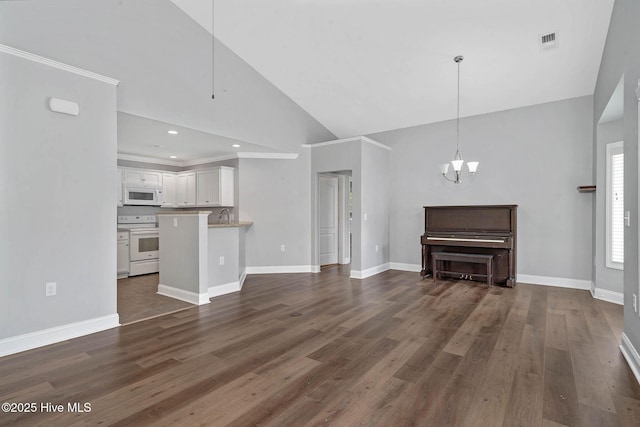 unfurnished living room featuring high vaulted ceiling, a chandelier, dark wood-type flooring, a sink, and baseboards