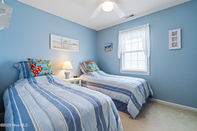 bedroom featuring carpet, baseboards, and ceiling fan