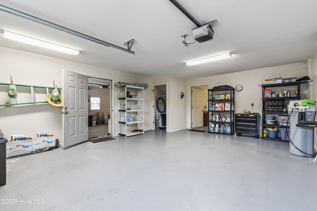 garage featuring a garage door opener