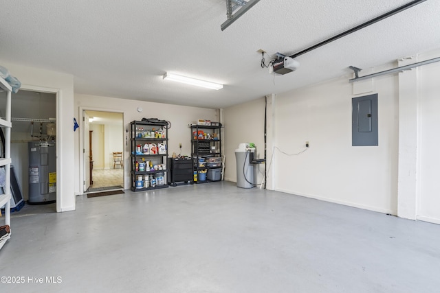 garage featuring water heater, electric panel, and a garage door opener