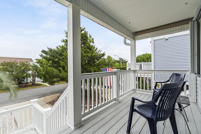 wooden terrace with covered porch