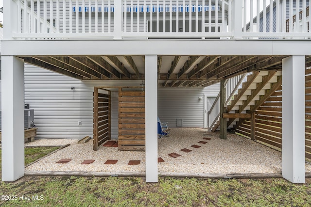 view of patio / terrace with stairs and central AC unit