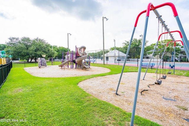communal playground featuring a tennis court