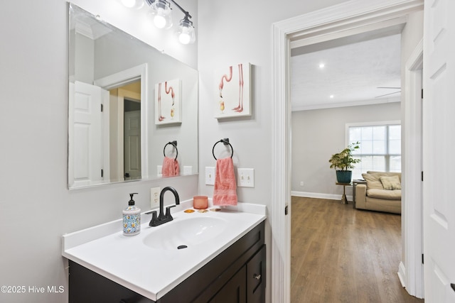 bathroom featuring vanity and wood finished floors