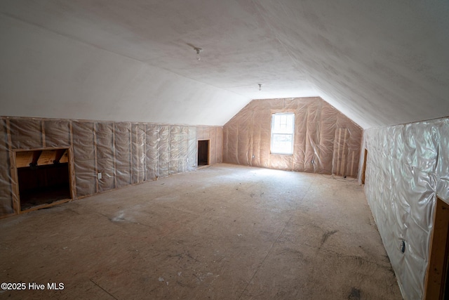 bonus room featuring lofted ceiling