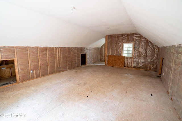 bonus room featuring vaulted ceiling