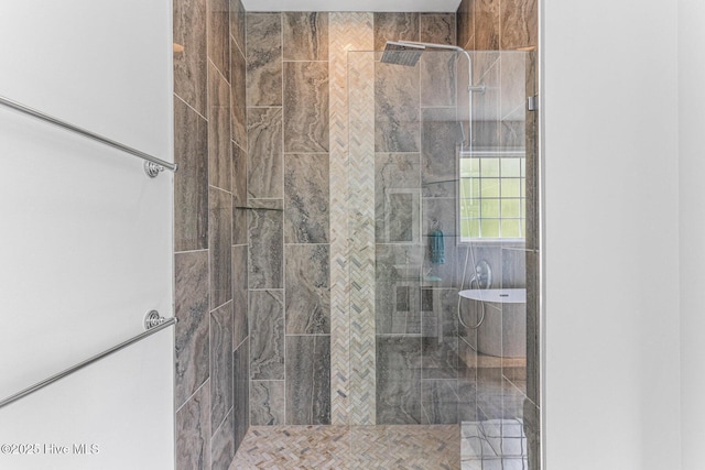 full bath featuring a tile shower and a freestanding tub