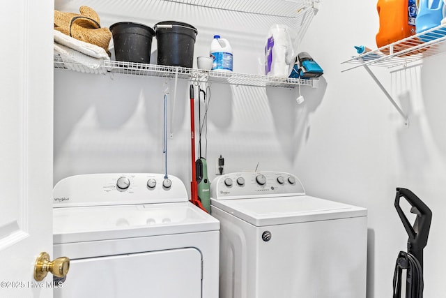 laundry room with washer and clothes dryer