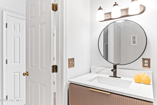 bathroom featuring vanity